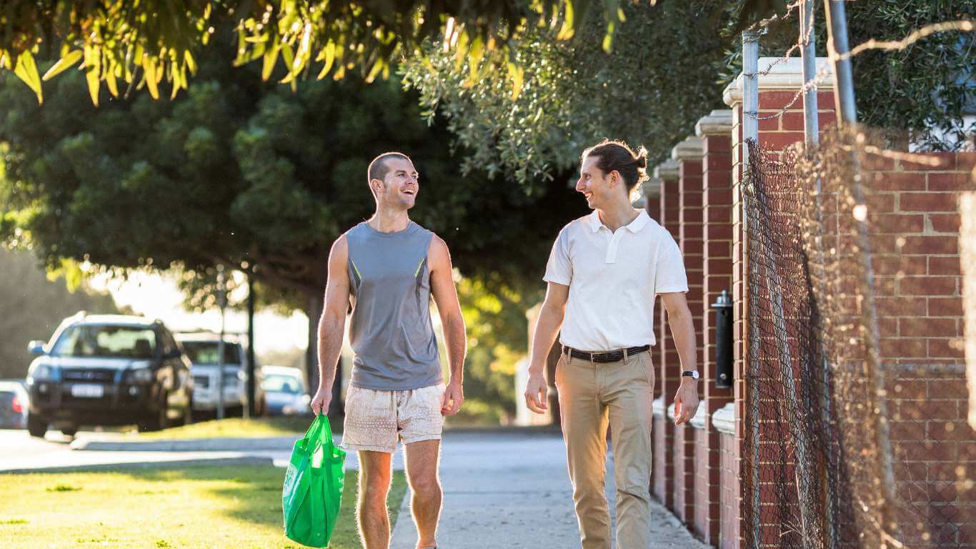 Positive Behaviour Support (PBS) Services_disability client walking with support worker in Vic Park